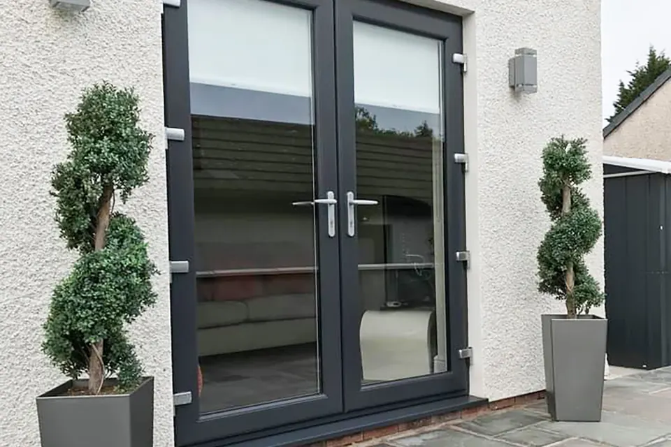 Anthracite grey French doors fitted by Cumbria Superglaze